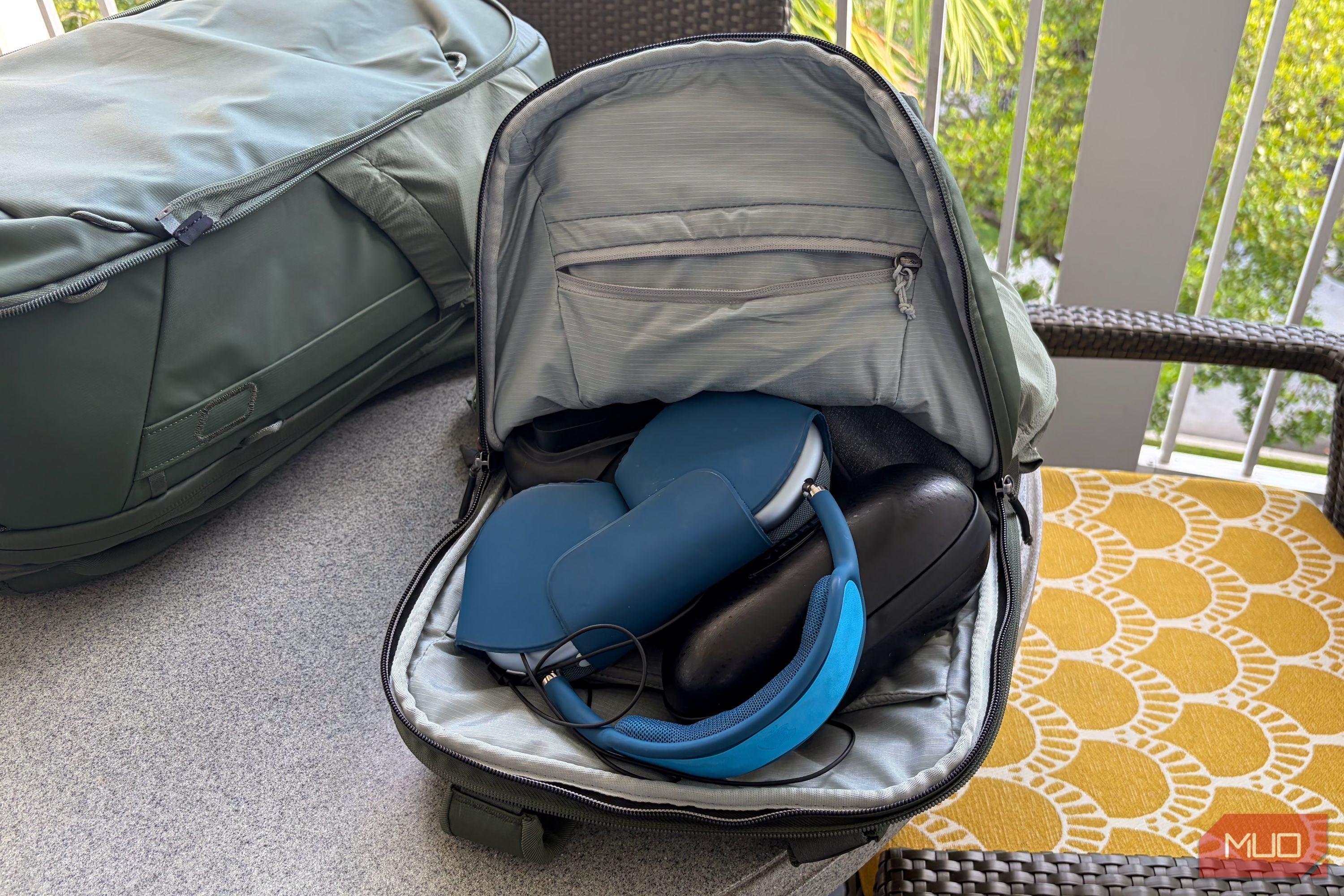 The tech items in the daypack portion of the Peak Design 2-in-1 travel backpack.