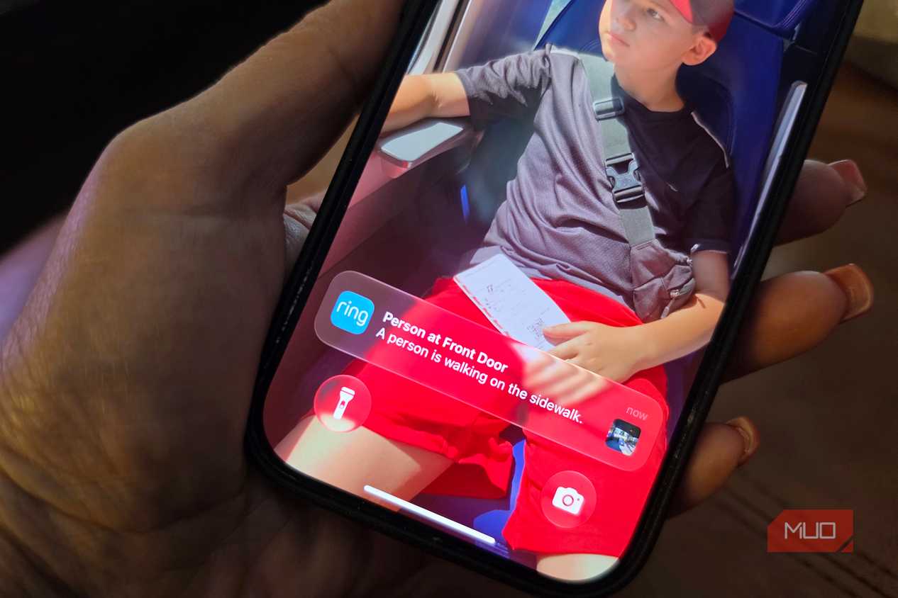 An iPhone showing Ring notification on the lock screen.