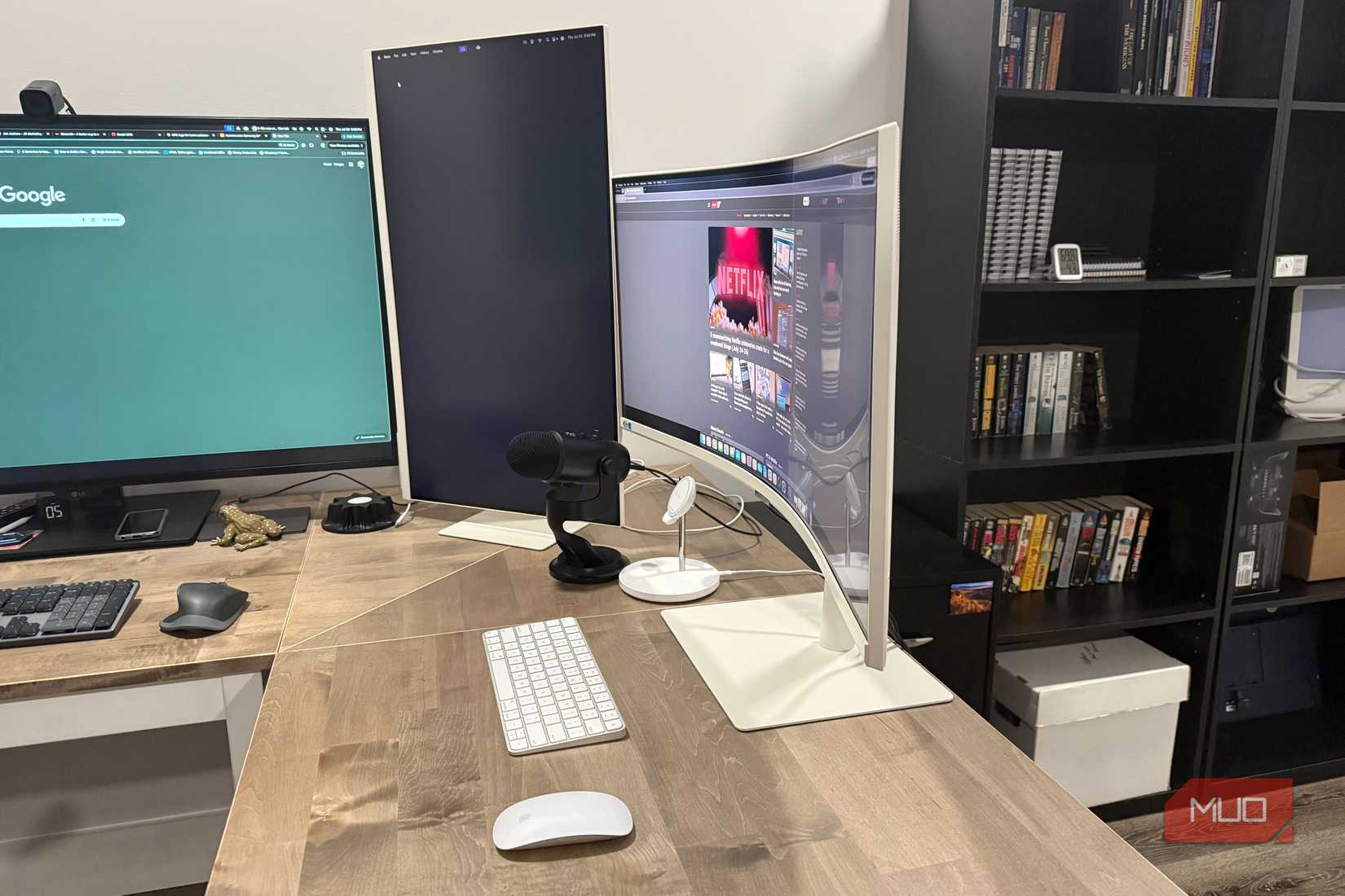 Samsung ViewFinity ultrawide monitor angled side view with vertical second monitor
