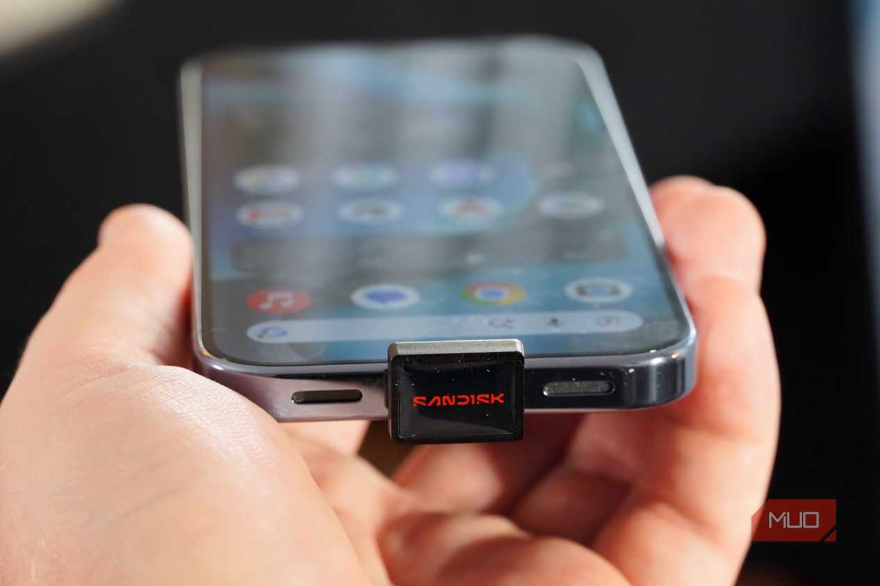 A SanDisk USB-C drive plugged into a Pixel 10 Pro.