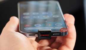 A SanDisk USB-C drive plugged into a Pixel 10 Pro.
