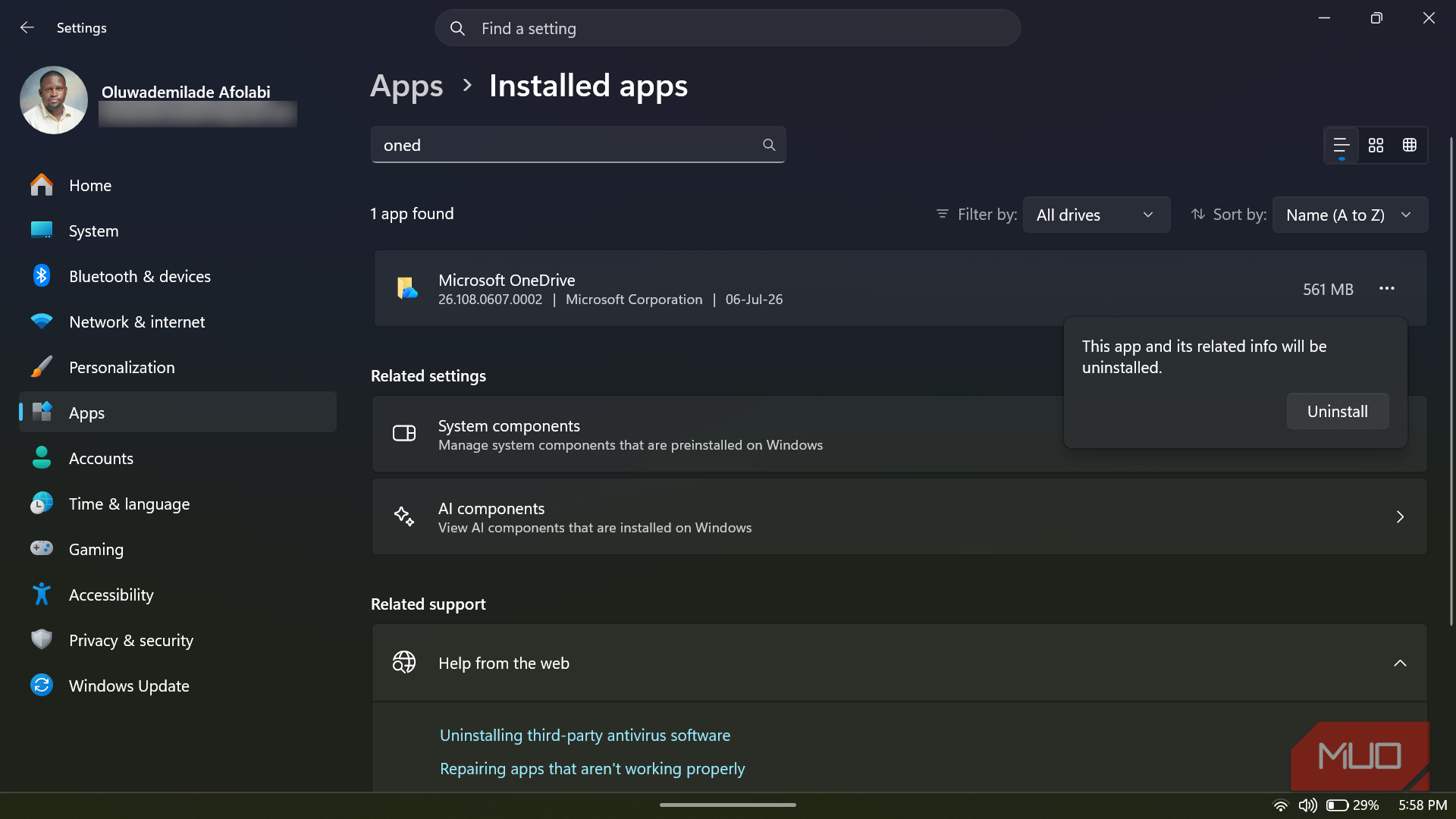 Windows 11 settings showing OneDrive uninstall prompt