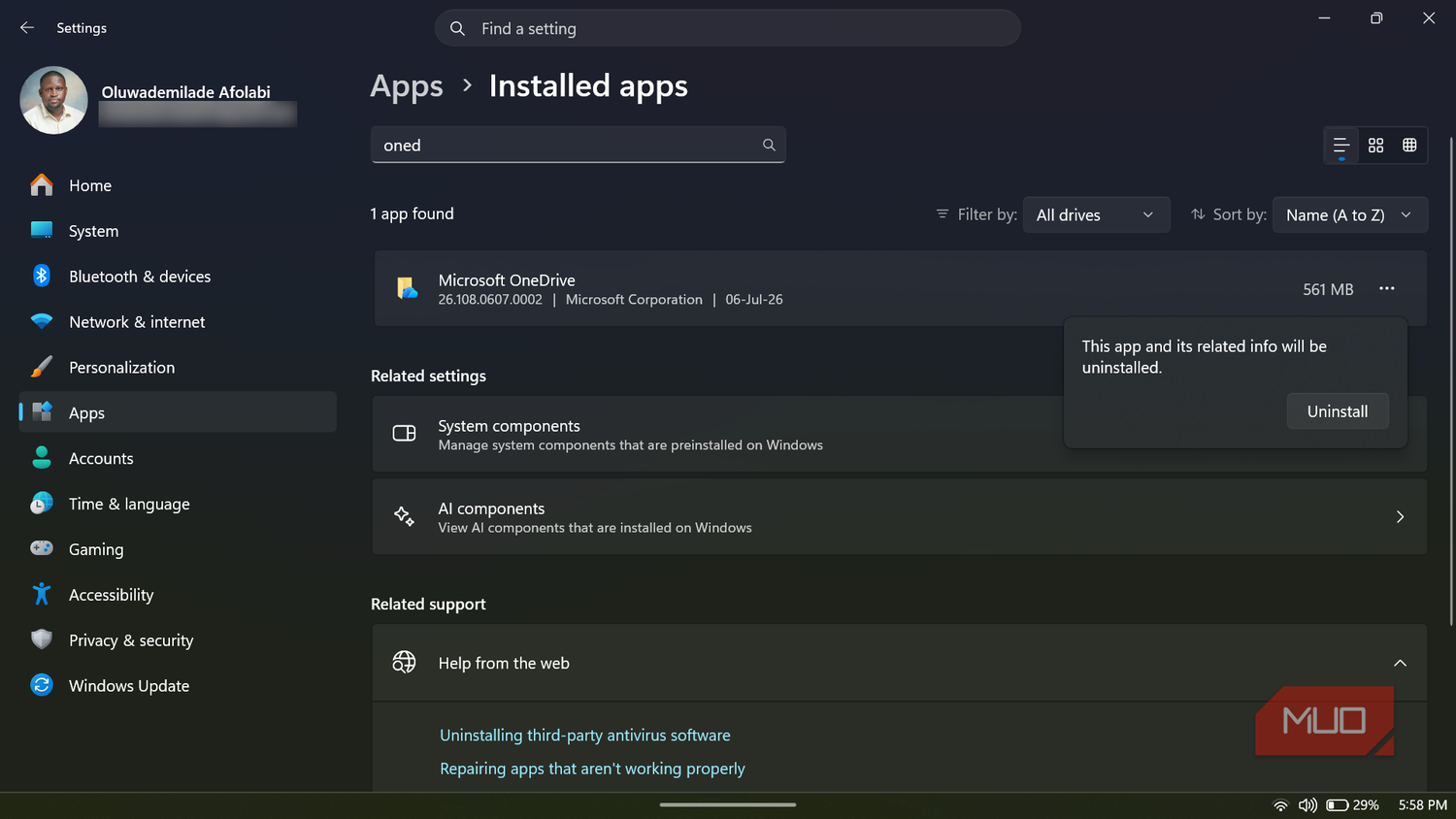 Windows 11 settings showing OneDrive uninstall prompt