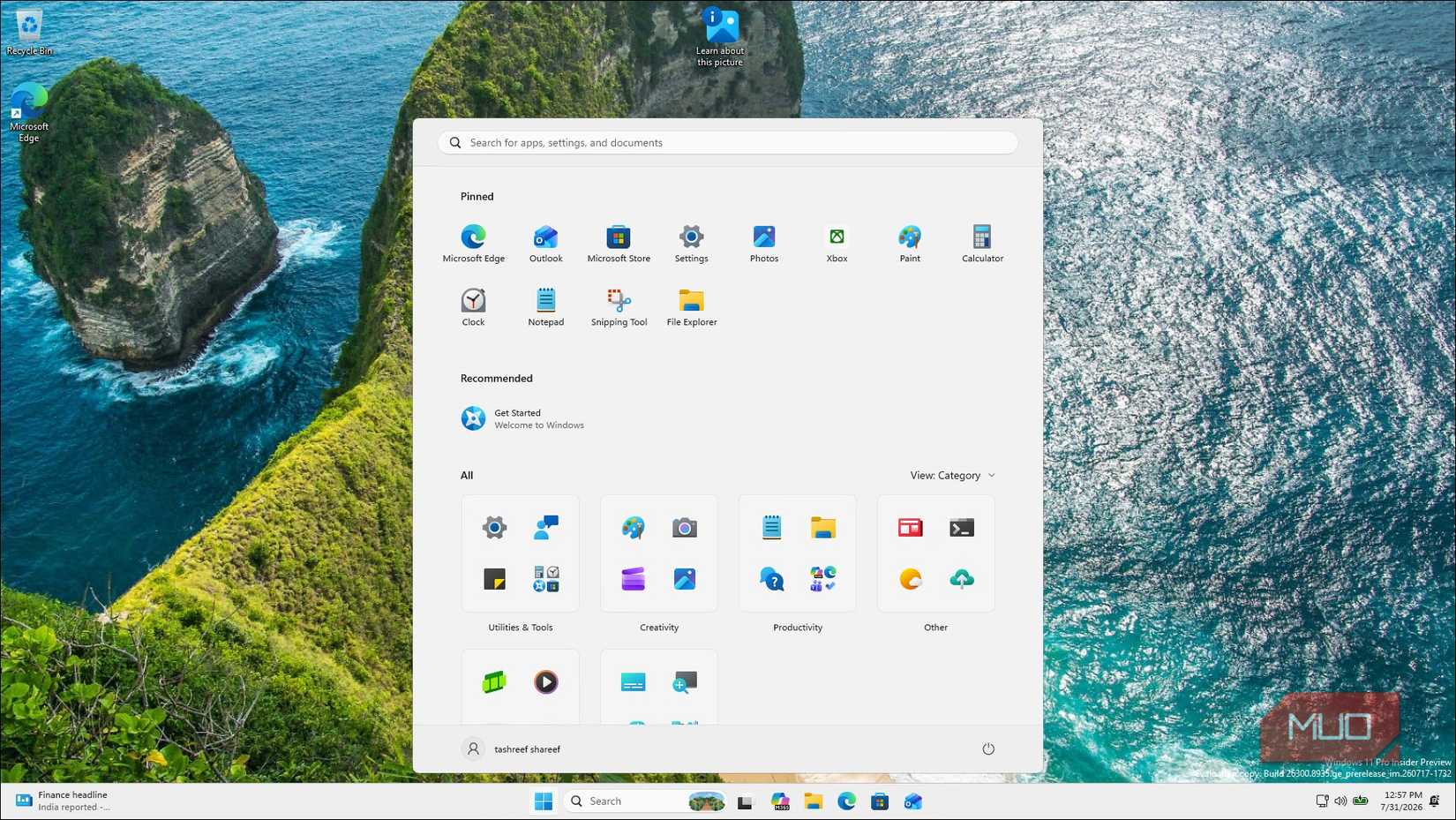 Windows 11 Start Menu With Apps And Coastal Cliff Background