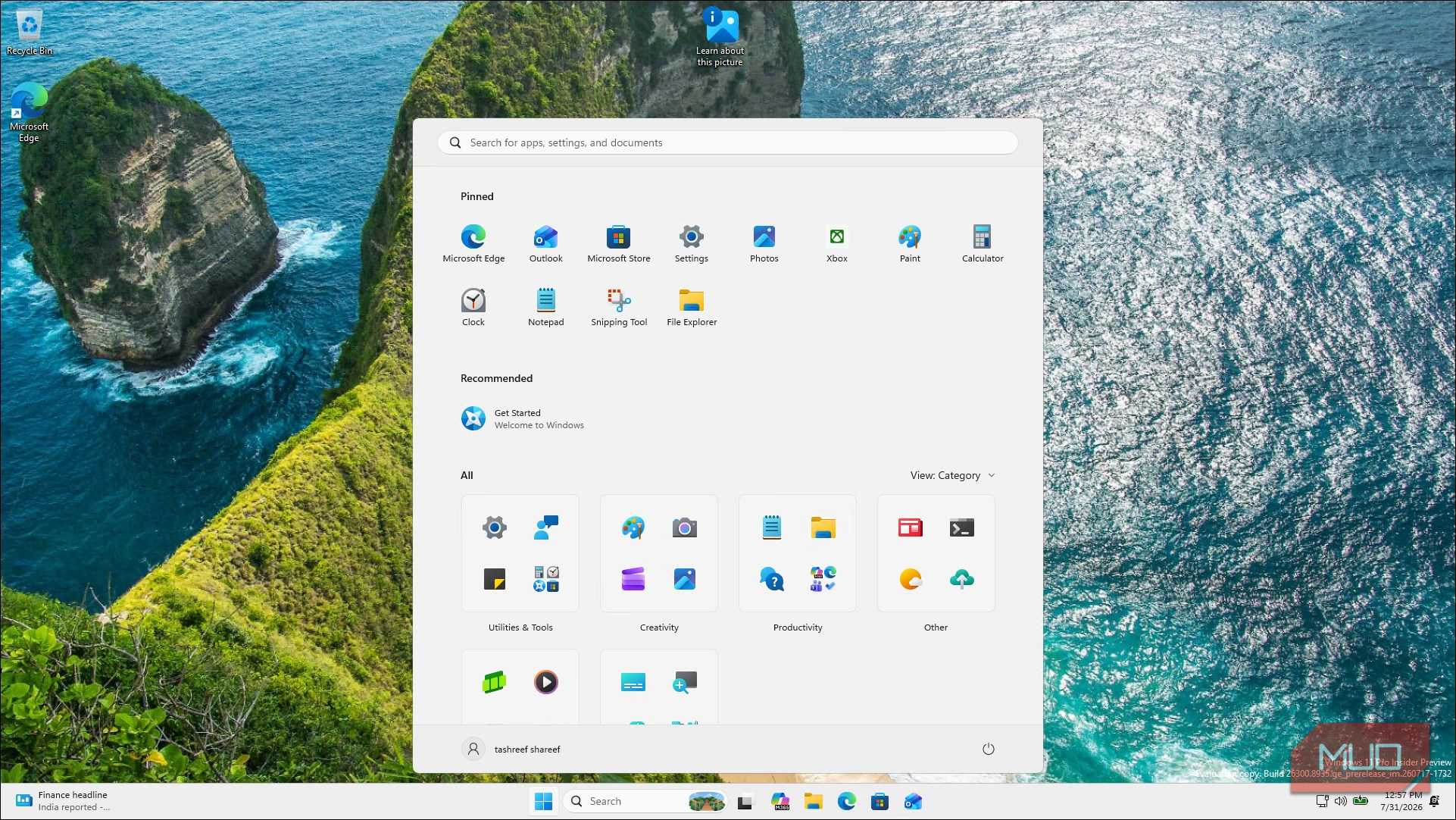 Windows 11 Start Menu With Apps And Coastal Cliff Background