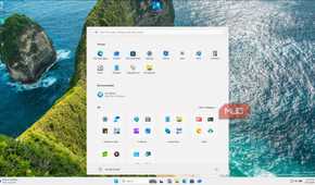 Windows 11 Start Menu With Apps And Coastal Cliff Background