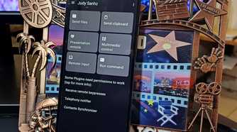 An Android phone with Zorin Connect on its display leaning on a frame
