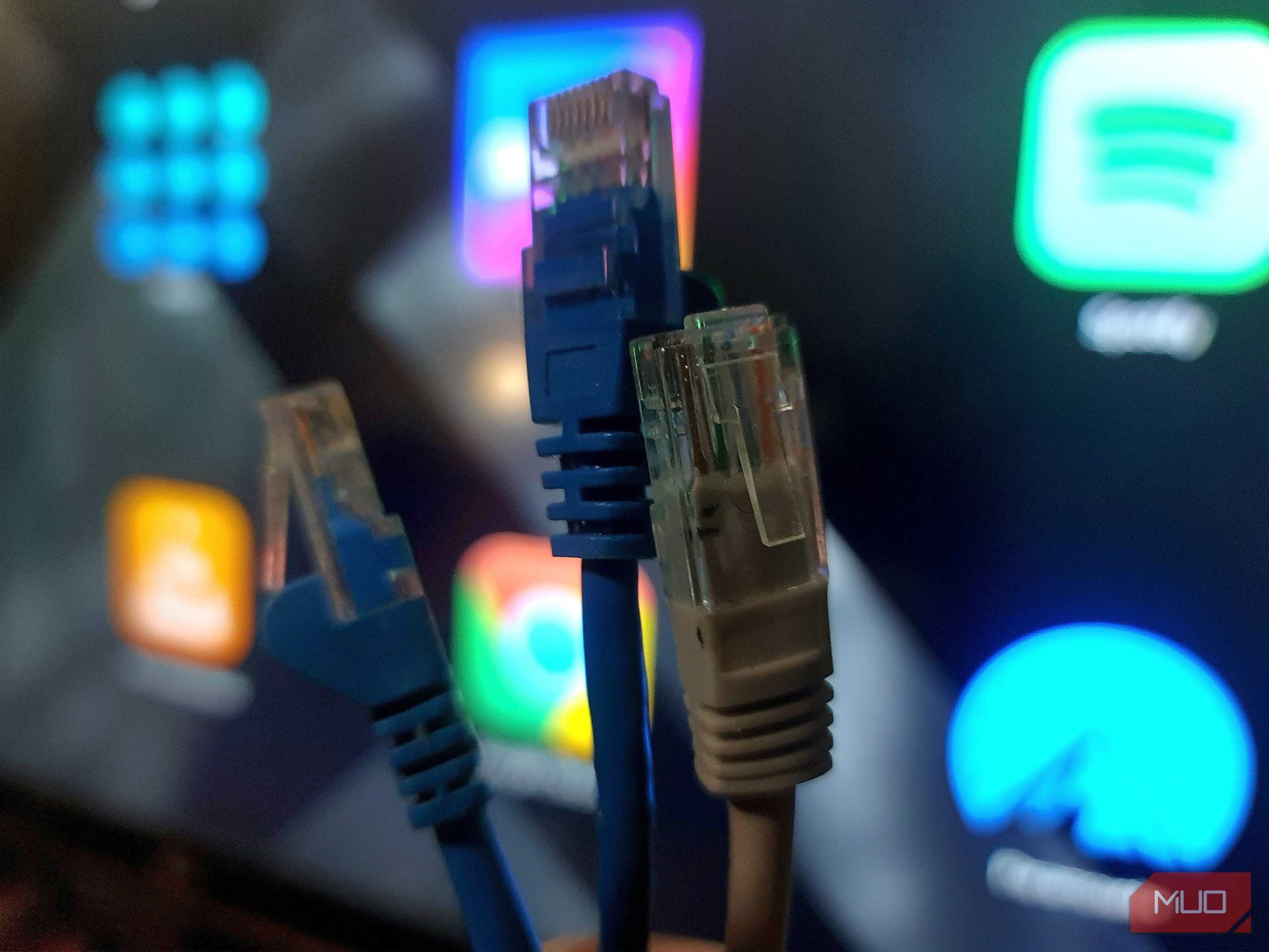 Three ethernet cables, 2 cat5e, 1 cat6a selected for speed testing