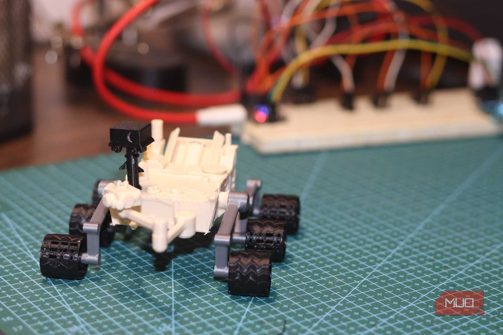 3D printed NASA rover with wires.