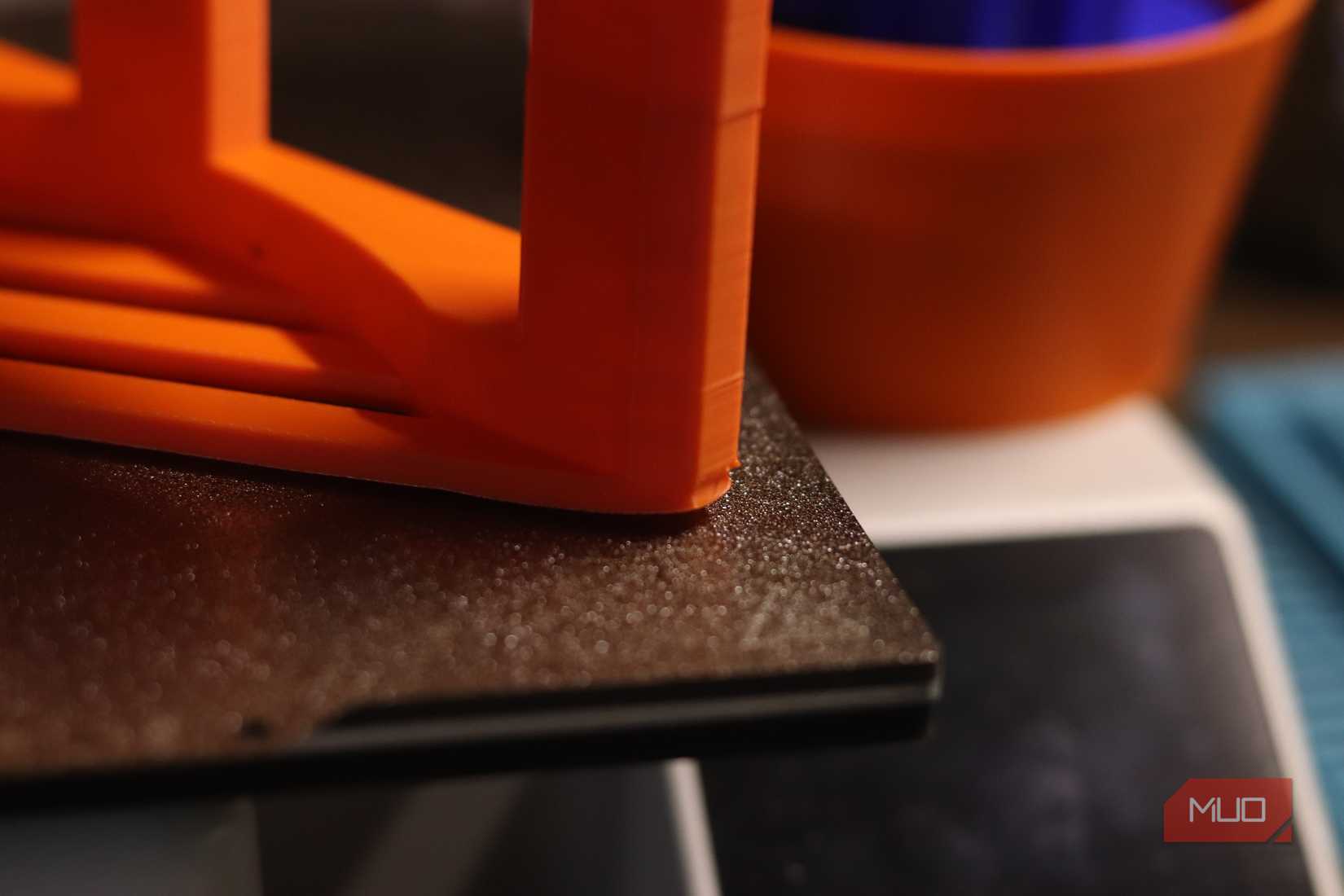 3D printed part warping from print bed.
