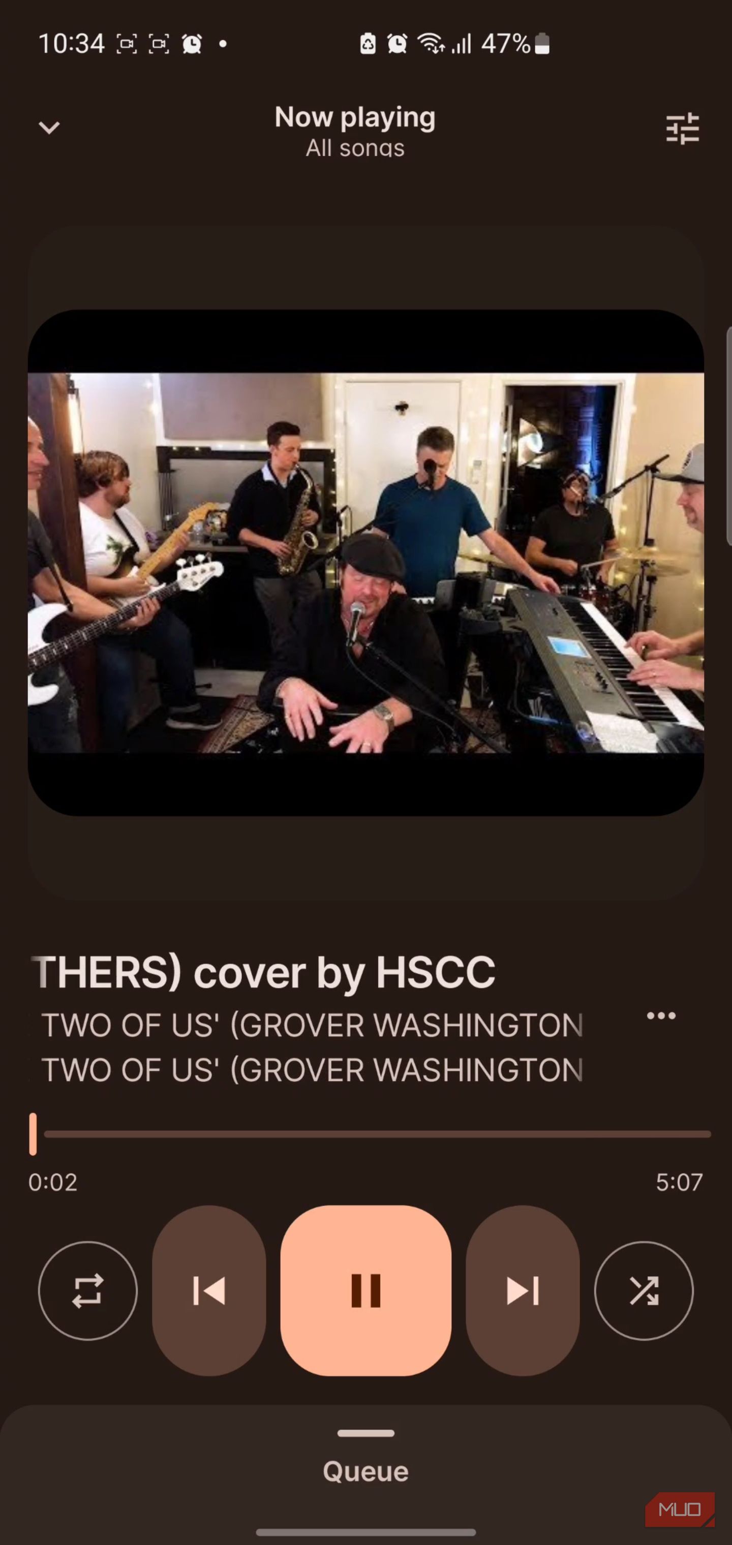 Auxio music player app playing a music video