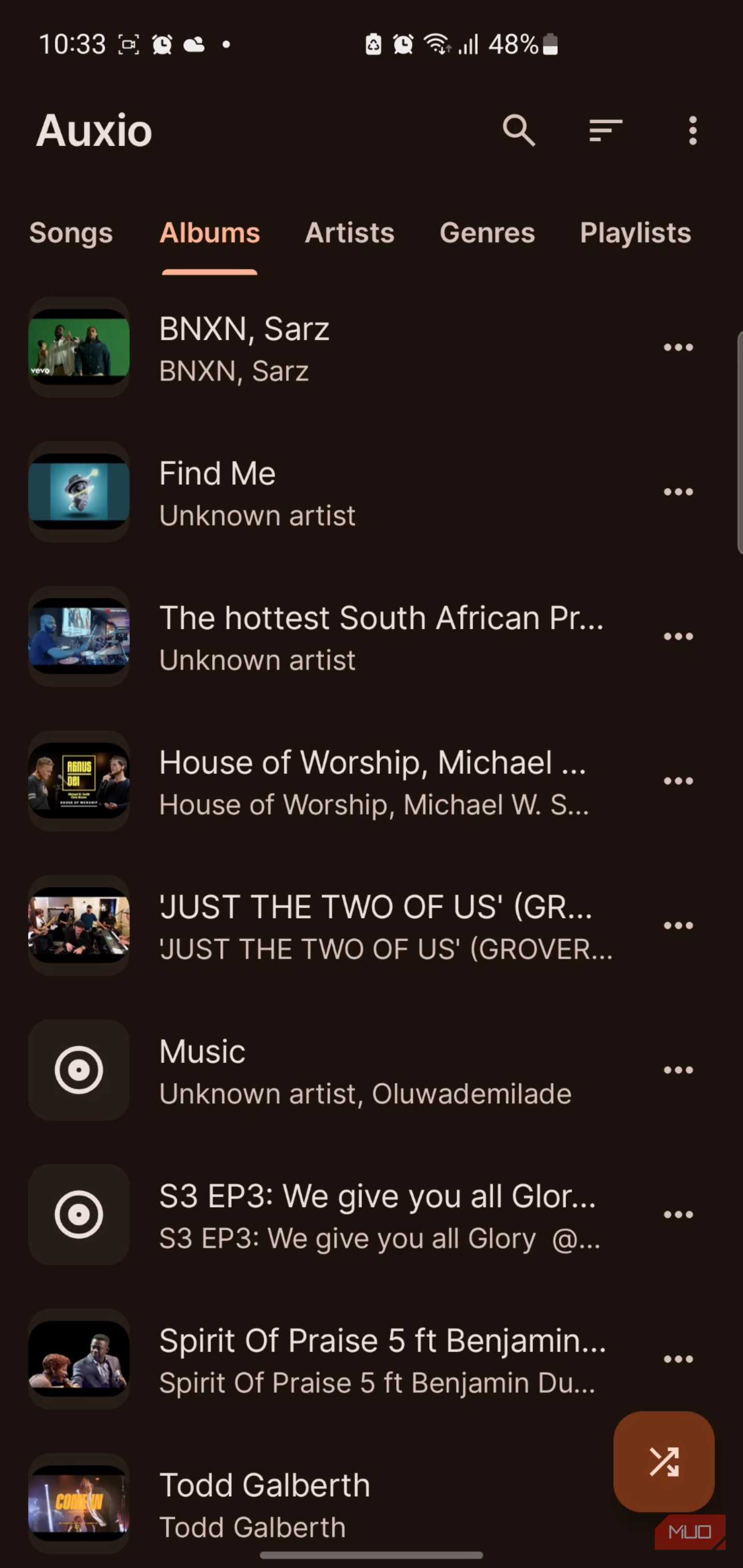 Auxio music player app showing albums list