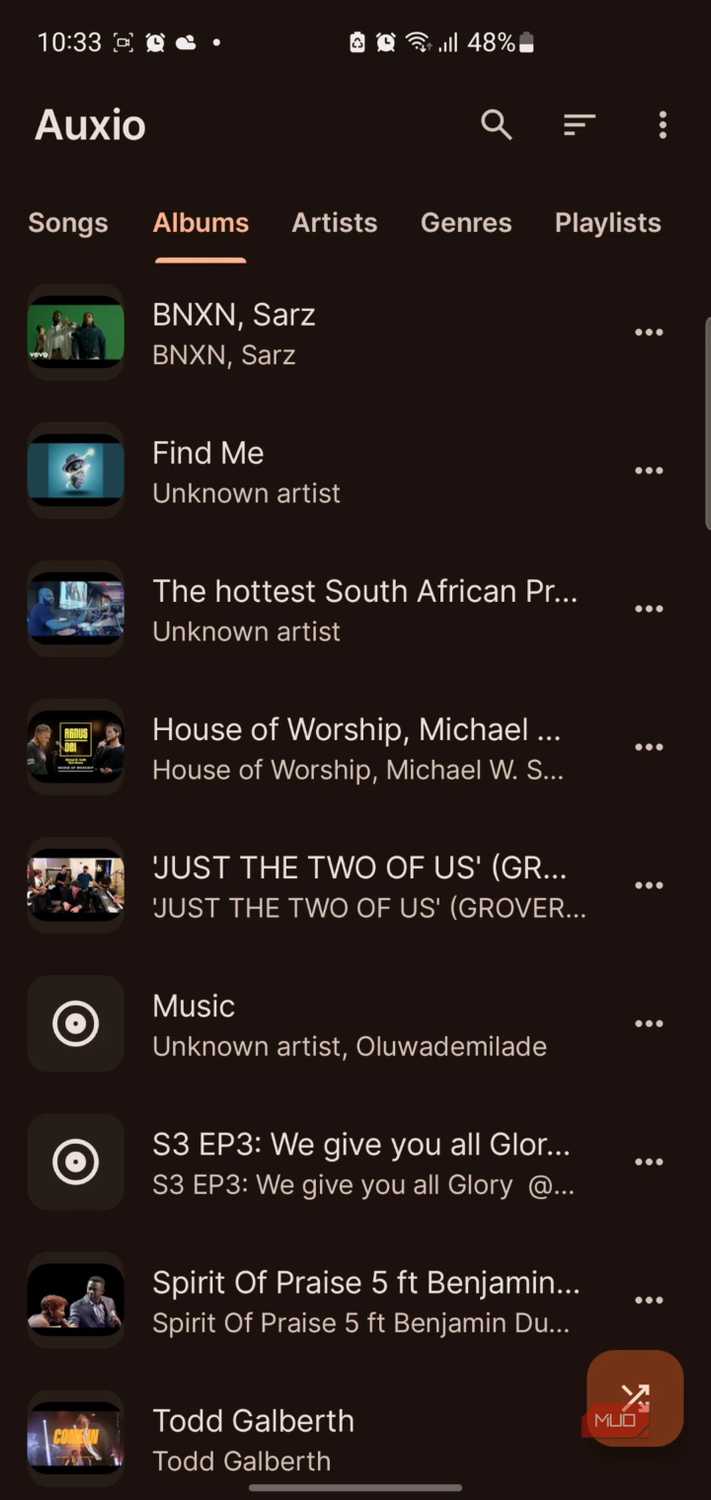 Auxio music player app showing albums list
