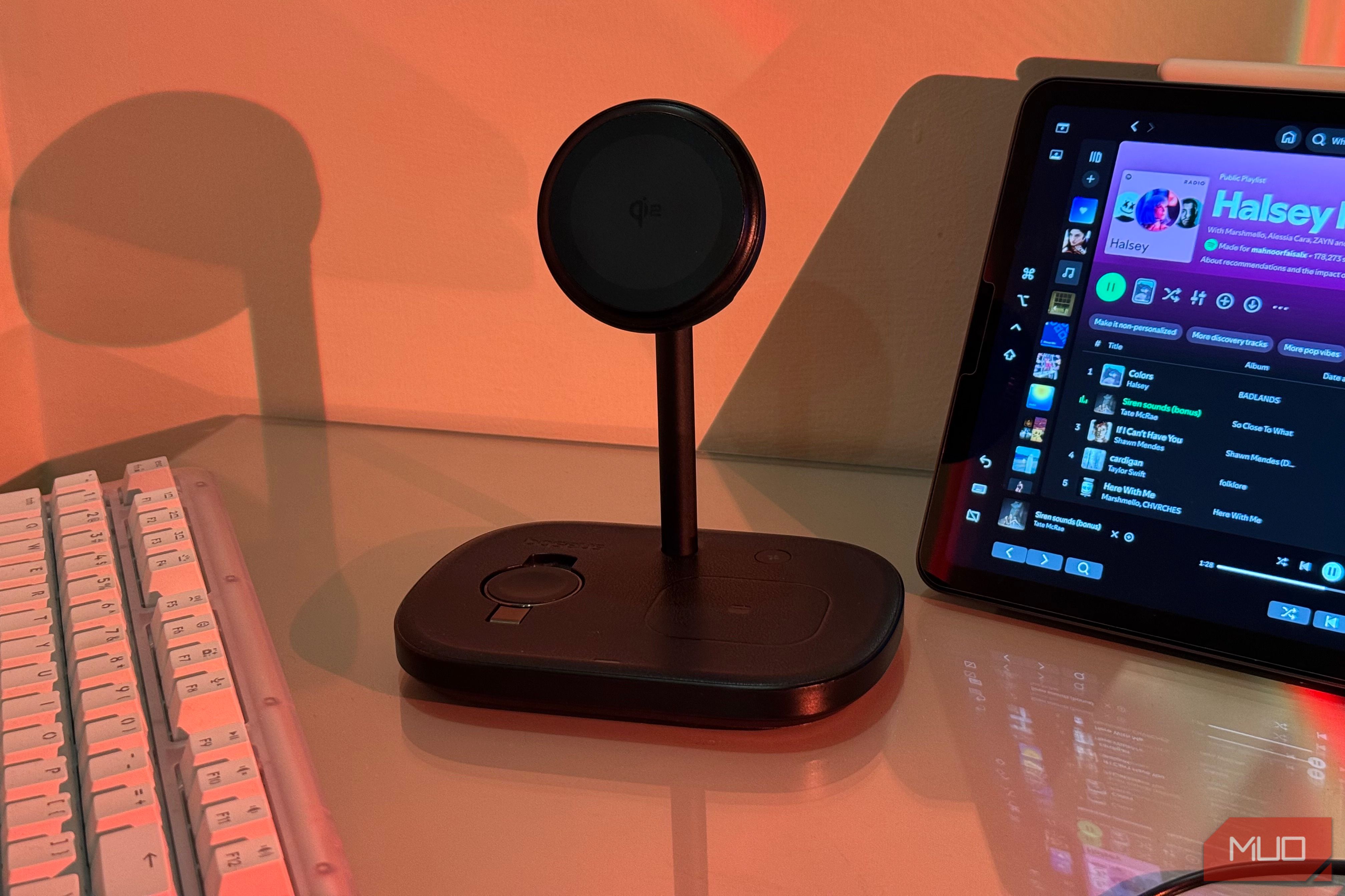 Baseus stand beside iPad showing Spotify Halsey Radio 2