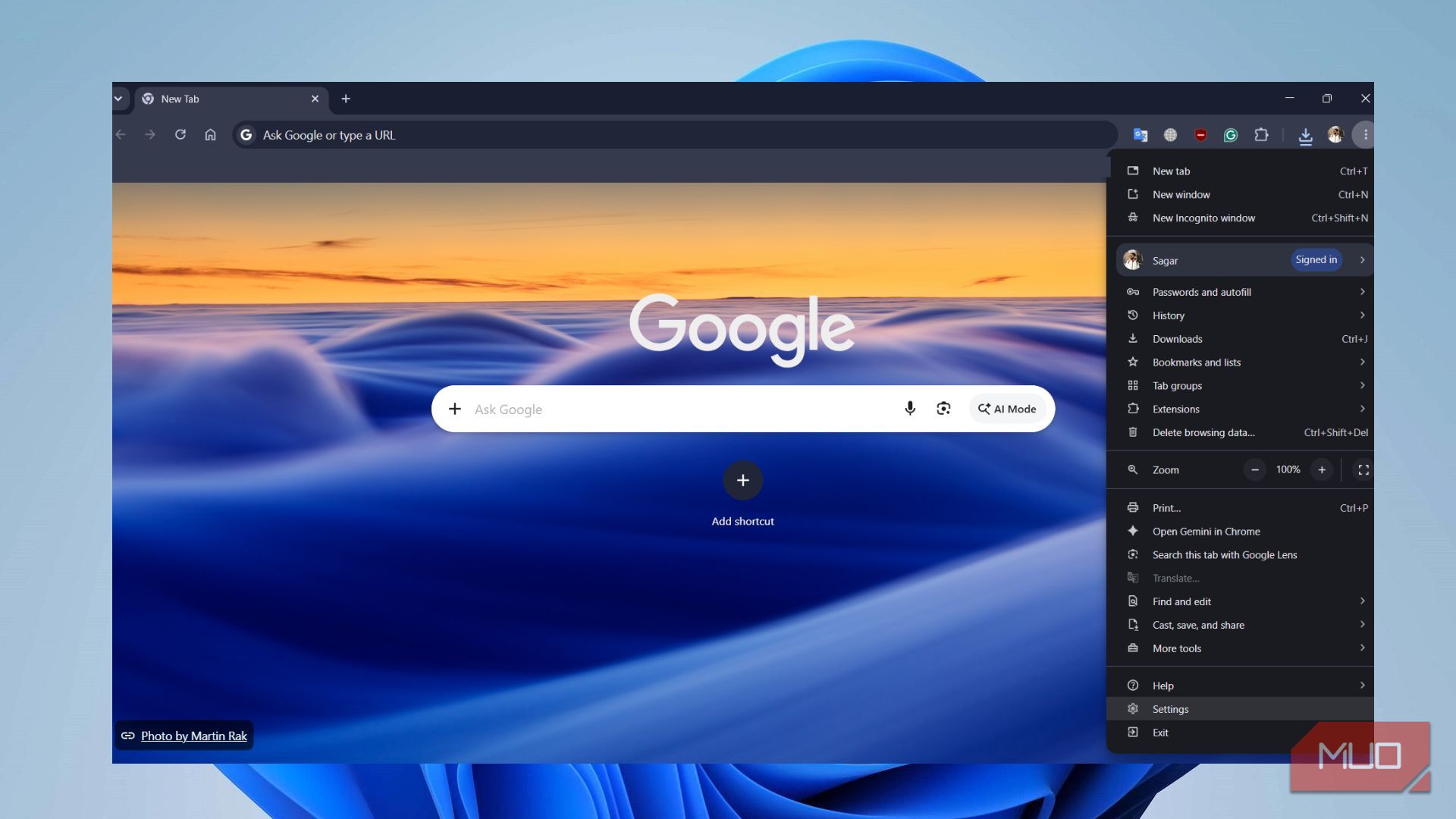 Google Chrome three-dot menu open on desktop showing the Settings option