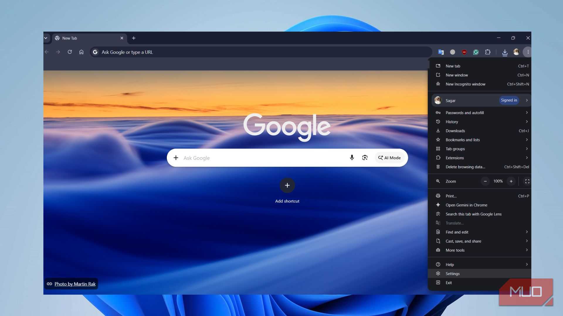 Google Chrome three-dot menu open on desktop showing the Settings option