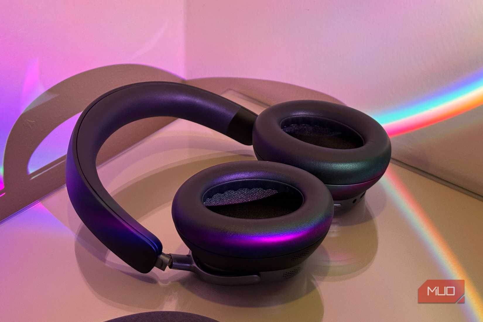 Close-up of headphones' padded ear cushions with mesh interior, headband behind