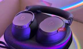 Close-up of two padded ear cushions on headphones, one leather one mesh-lined