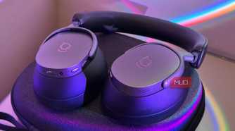 Close-up of two padded ear cushions on headphones, one leather one mesh-lined