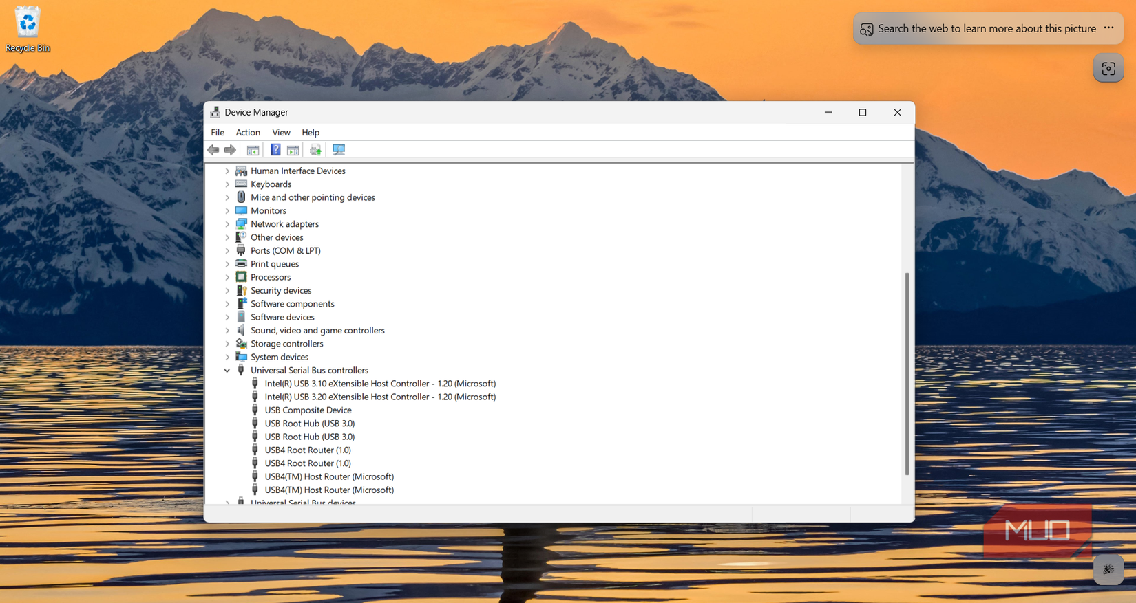Device Manager showing USB4 and USB 3.0 controllers listed