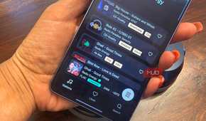An audio file being played in FLAC Lossless quality on a Samsung Galaxy S26 Ultra in hand.