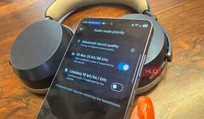 A Samsung Galaxy S26 Ultra showing Hi-Res audio with the Sennheiser Momentum 5 Wireless headphones in the background.