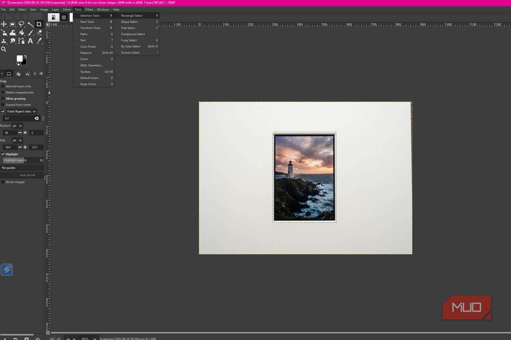 GIMP showing Tools > Selection Tools with Rectangle Select and a rectangle selection around a lighthouse photo