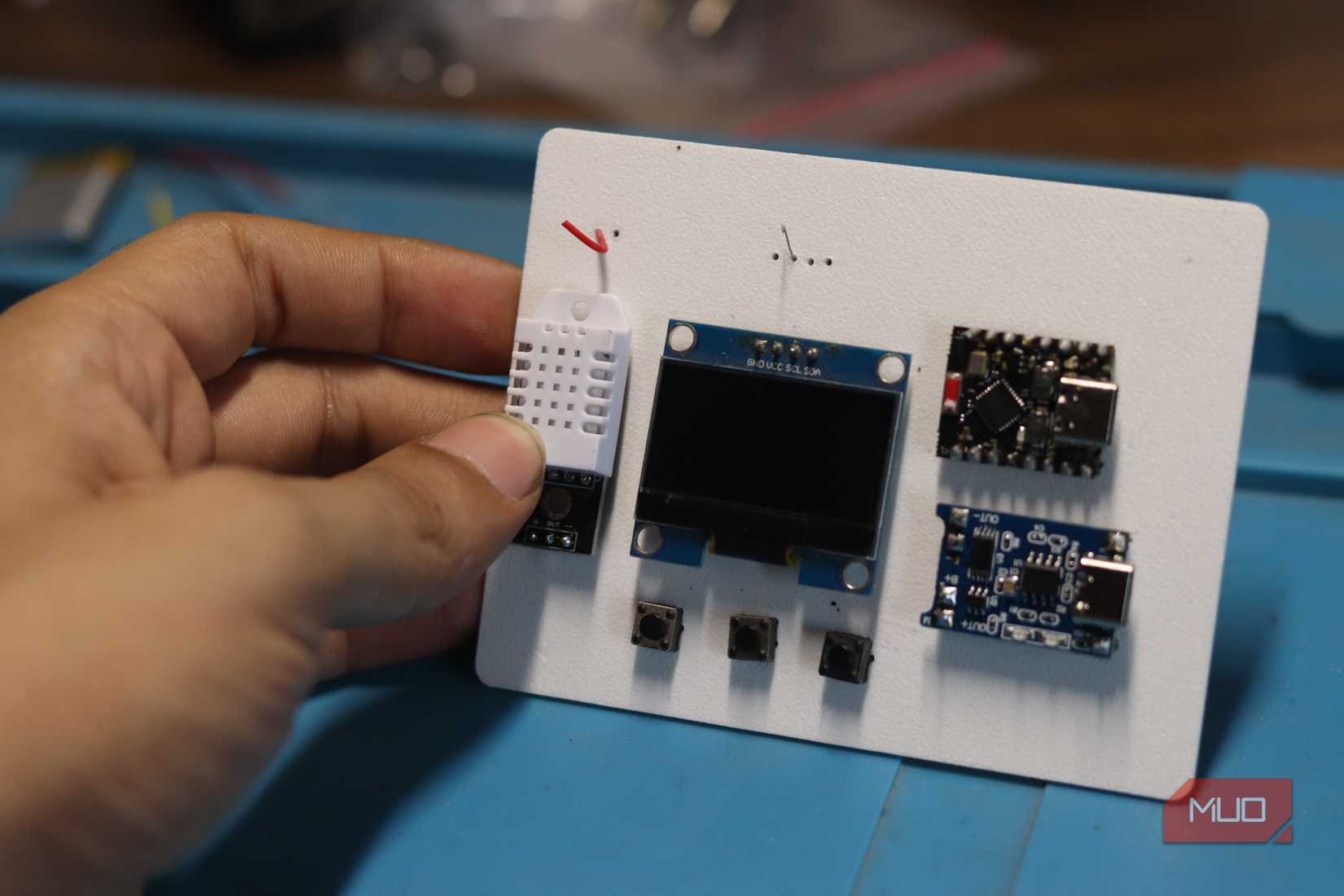 Hand holding 3D printed PCB