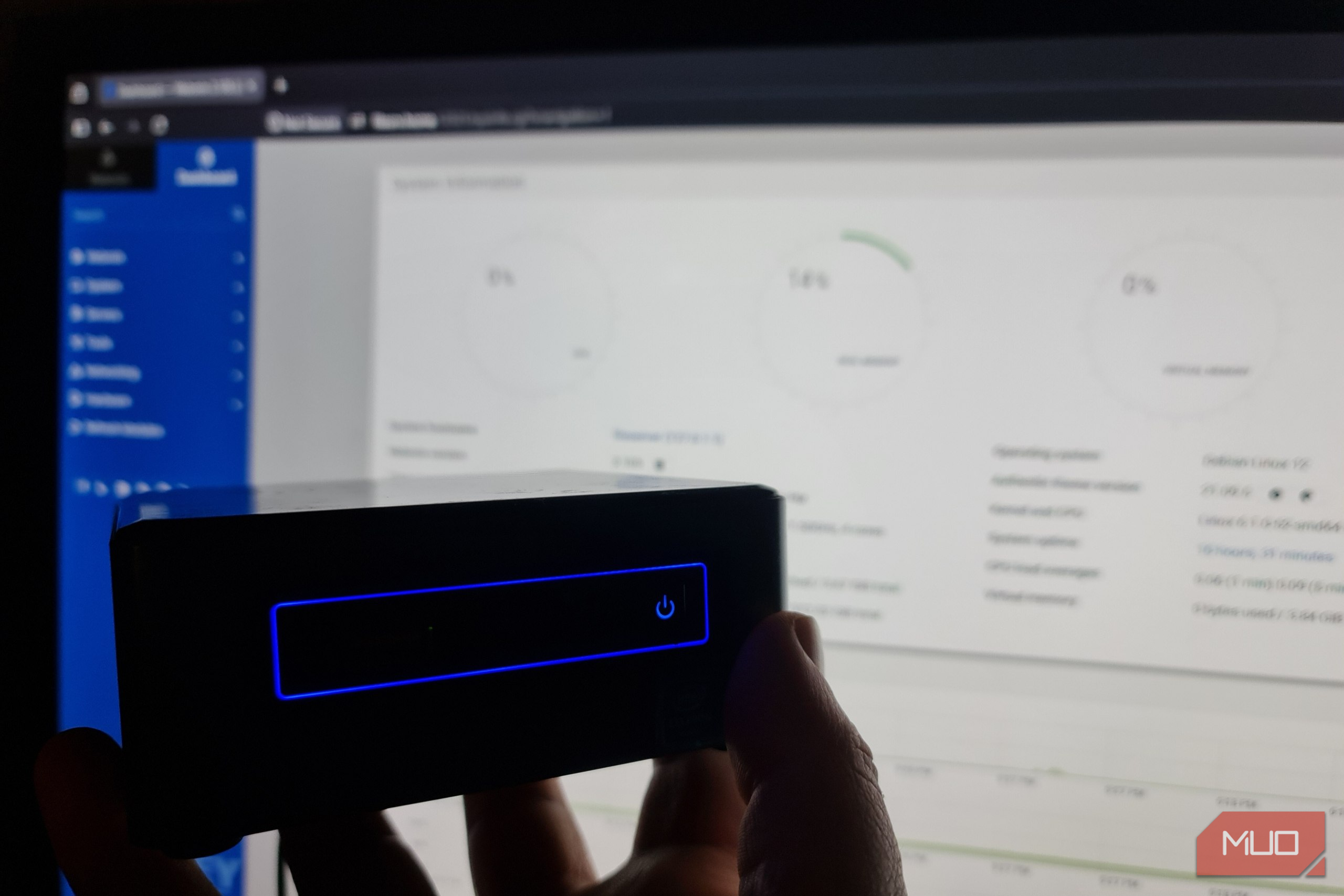 Holding up an Intel NUC PC with TurnKey Linux File Server installed