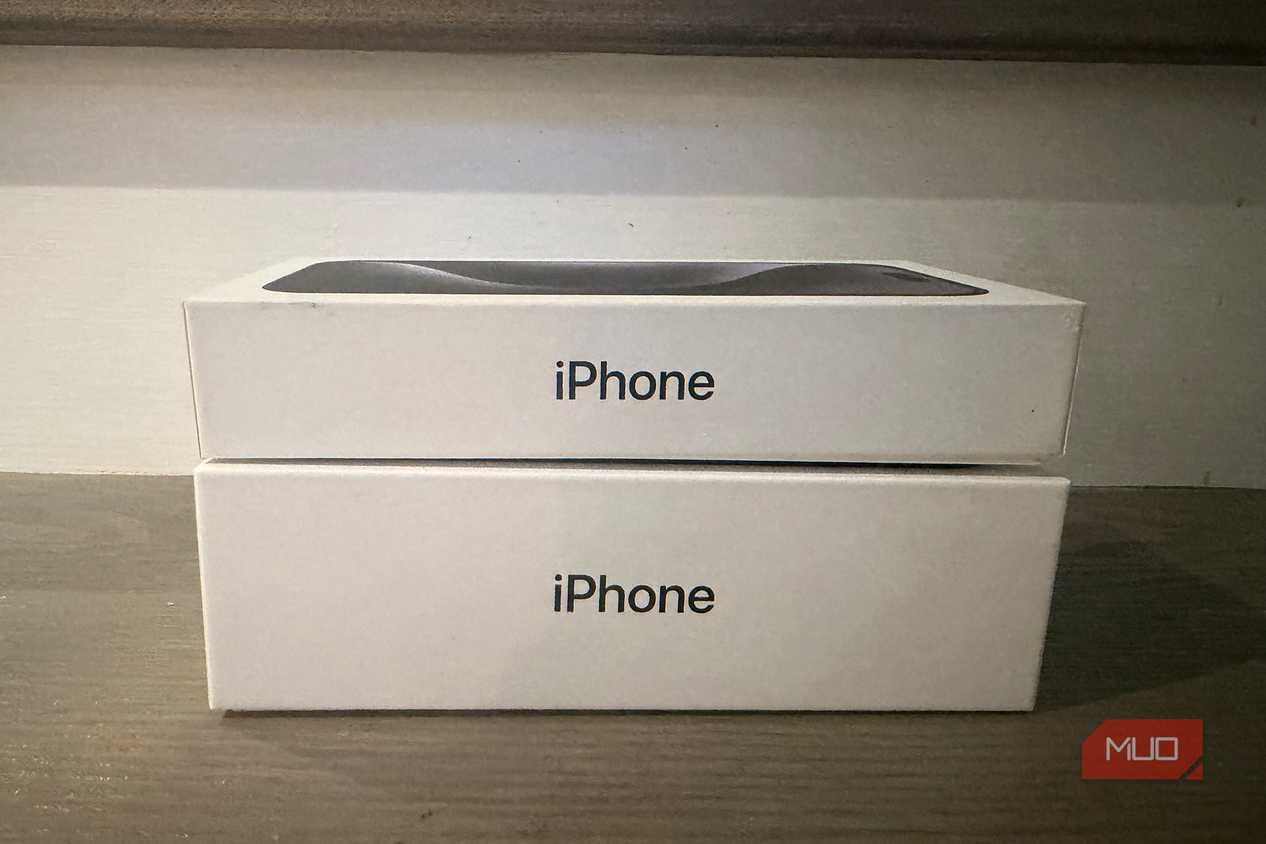 An old iPhone box under a newer one.