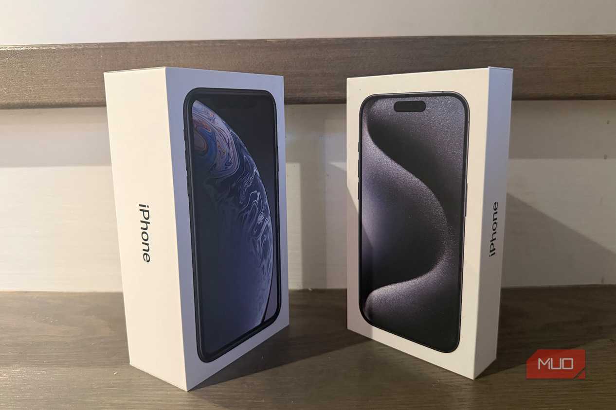 An old iPhone box beside a newer one.