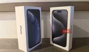 An old iPhone box beside a newer one.