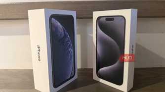 An old iPhone box beside a newer one.