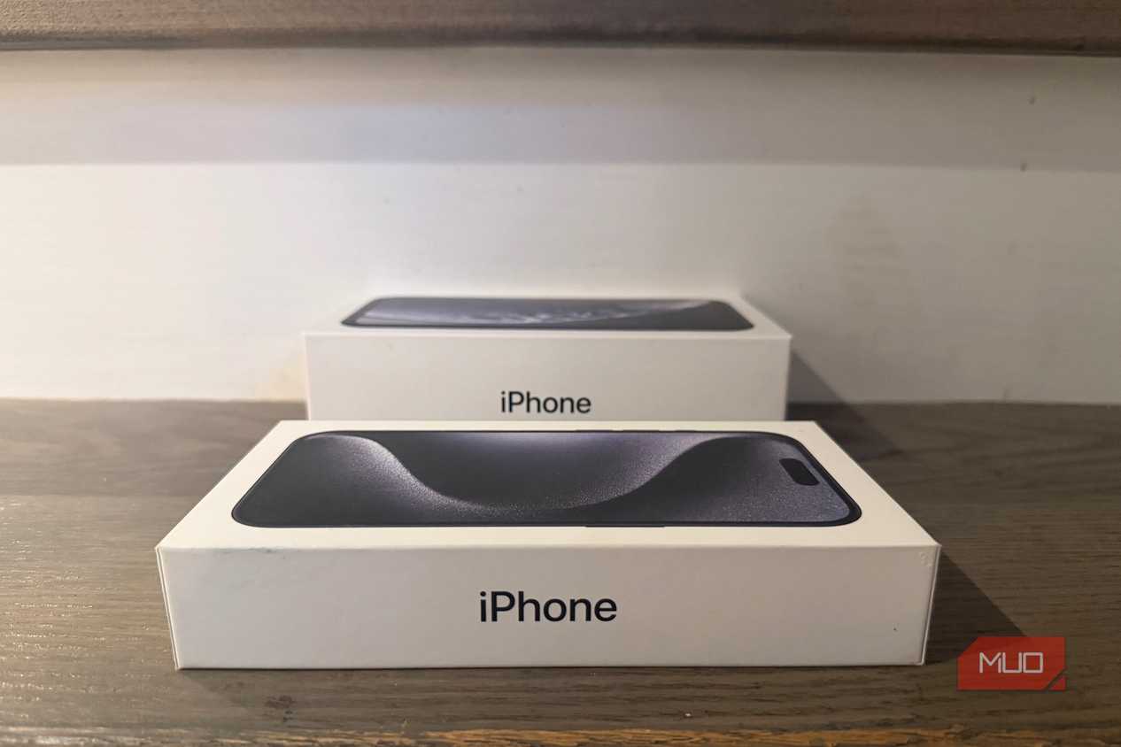 An old iPhone box beside a newer one.