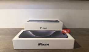An old iPhone box beside a newer one.