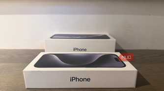An old iPhone box beside a newer one.