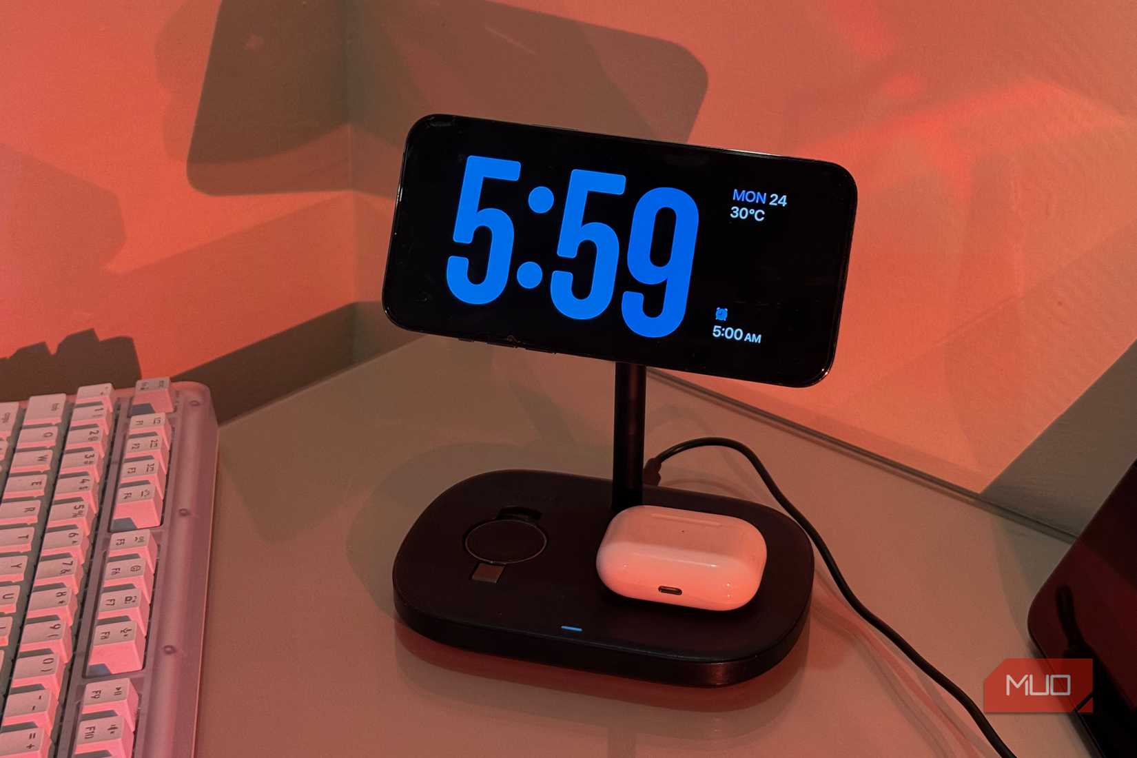iPhone lock screen 5-59 AM on Baseus stand with AirPods 1