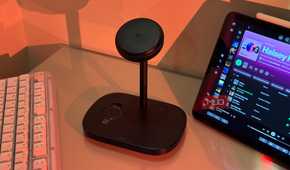 iPhone on Baseus stand with AirPods charging and iPad Spotify 1