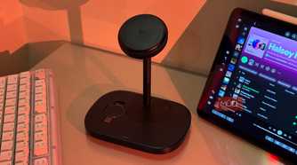iPhone on Baseus stand with AirPods charging and iPad Spotify 1