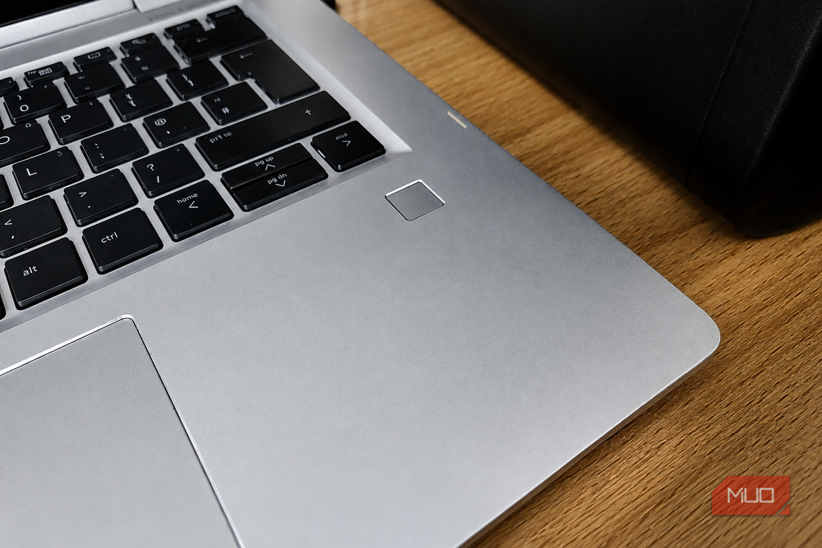 Laptop keyboard and fingerprint sensor.