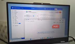 Laptop showing PairDrop and Docker windows