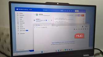 Laptop showing PairDrop and Docker windows
