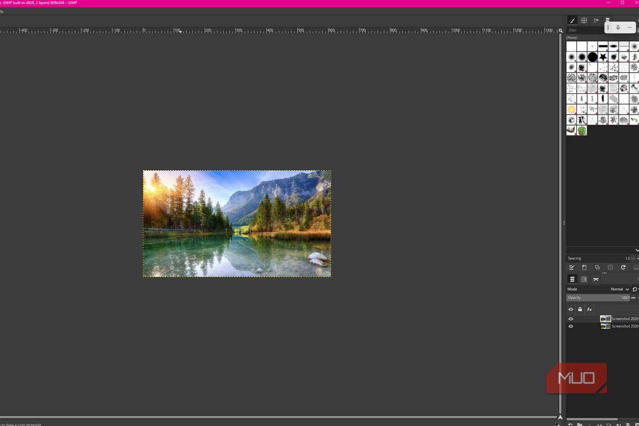 GIMP showing the lake photo after duplicating the original layer, with both layers visible in the Layers panel