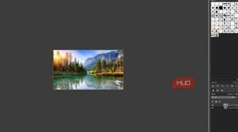GIMP showing the lake photo after duplicating the original layer, with both layers visible in the Layers panel