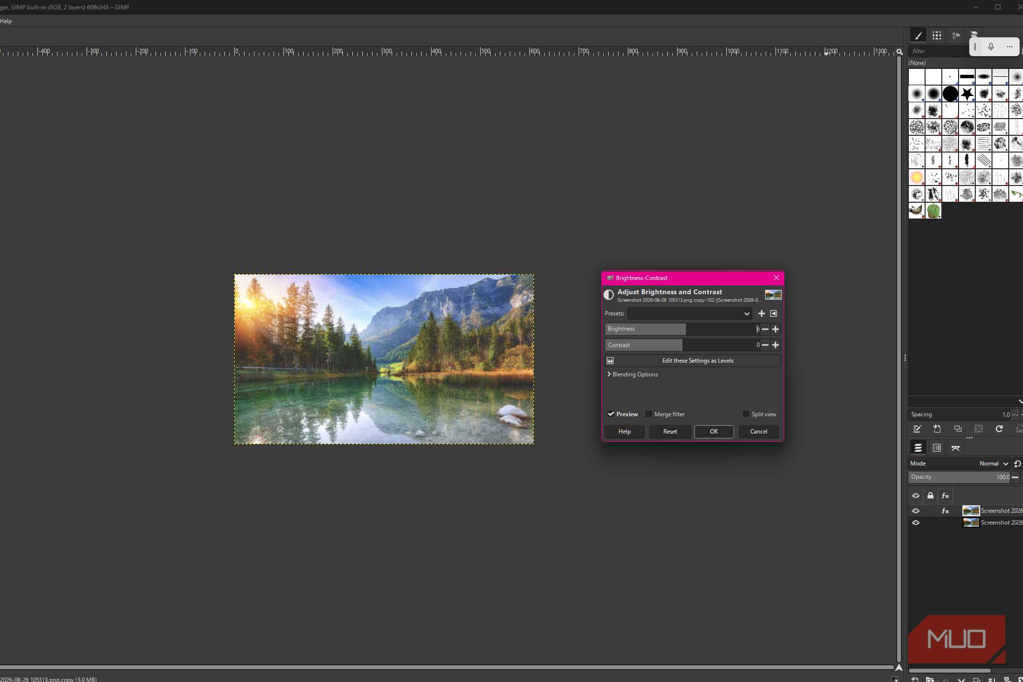 GIMP showing brightness-Contrast adjustments applied to the duplicate lake photo layer while the original remains underneath