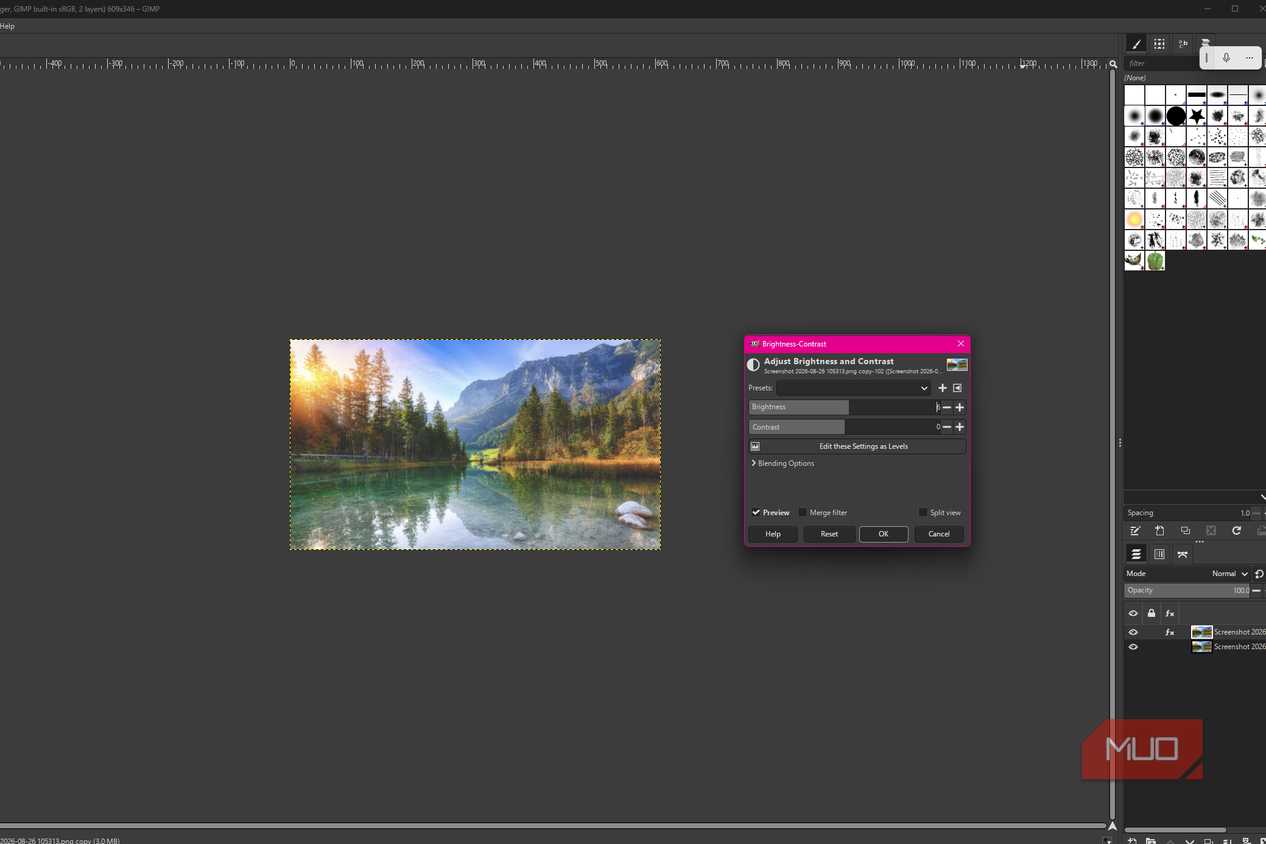 GIMP showing brightness-Contrast adjustments applied to the duplicate lake photo layer while the original remains underneath