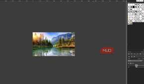 GIMP showing the edited duplicate layer hidden, showing the untouched original lake picture underneath
