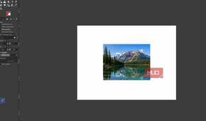 GIMP showing the original mountain lake photo before and levels adjustments are applied