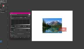 GIMP showing the levels dialog open with the mountain lake photo and the default input level settings