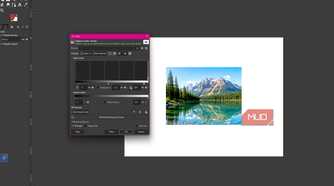GIMP showing Levels adjustments applied to brighten the mountain lake photo and bring out more detail